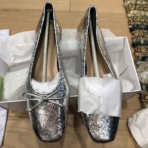 BRAND NEW, NEVER WORN Schutz silver flats
